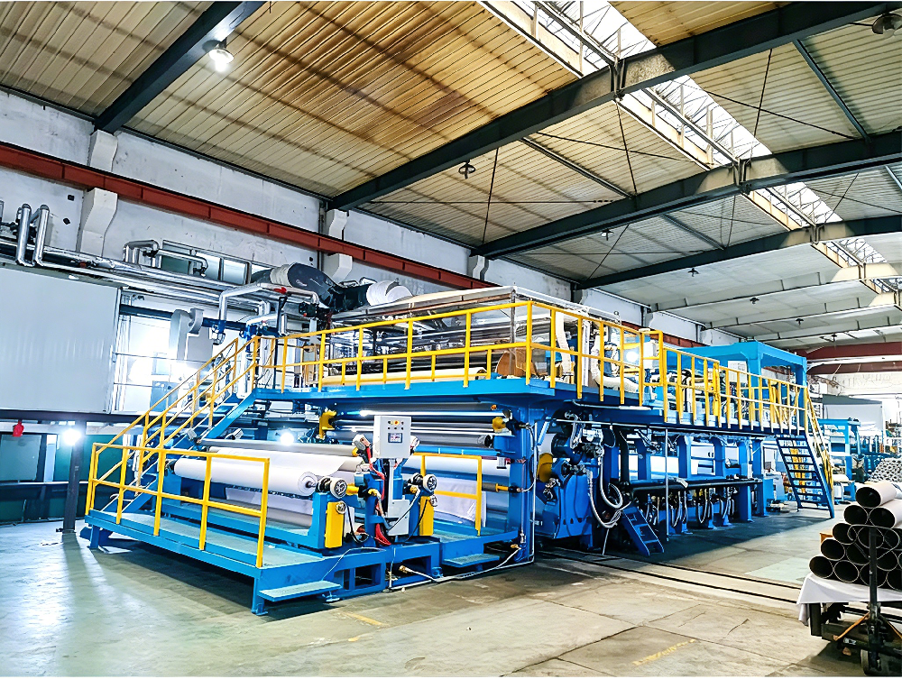 How does the drying system of a four-layer light box cloth laminating machine balance efficiency and the risk of thermal deformation of the film material?